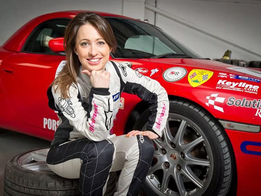 Rebecca Jackson, racing driver, with her Porsche race car